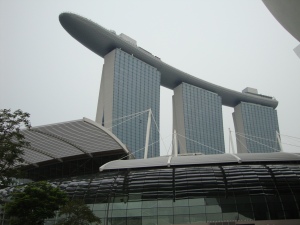 Marina Bay Sands houses a skating rink, a mall, a casino, a rooftop bar, and an auditorium.